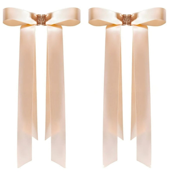 Instructions for using the magnetic bow hair clip to achieve quick, voluminous hair for women.
