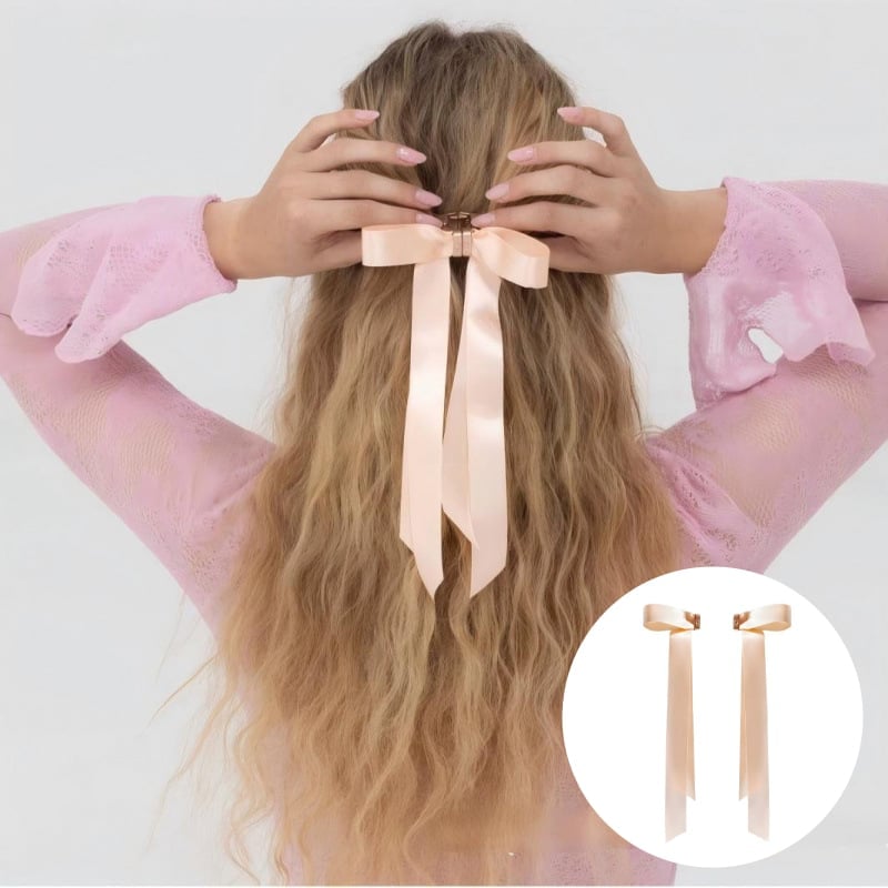 Women's black bow hair clip with magnetic closure, perfect for quick and voluminous styling.