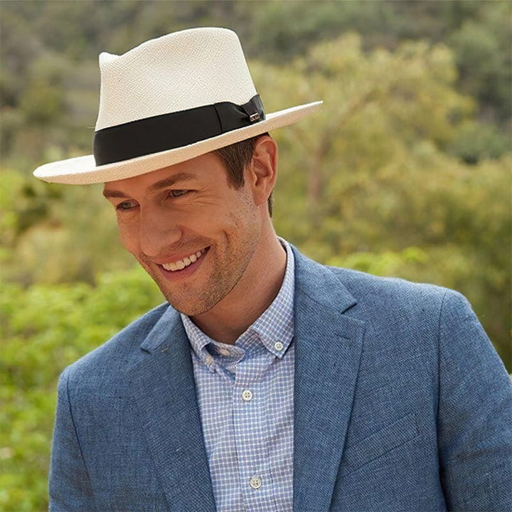 Stylish men's Panama sun hat. Ideal for travel, beach, & summer elegance. Fedora style.