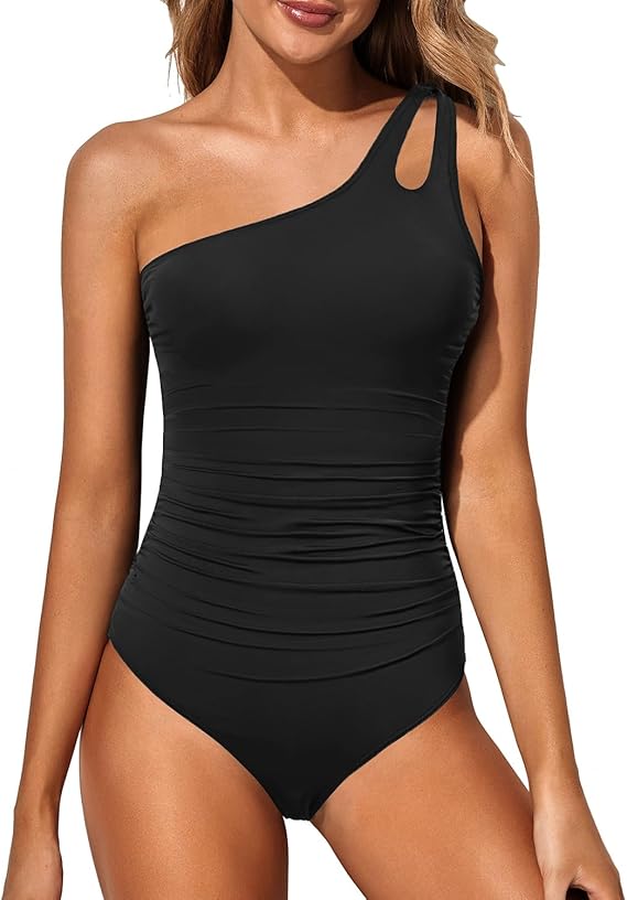 Women's elegant one-shoulder beachwear, tummy control for a sophisticated poolside style.