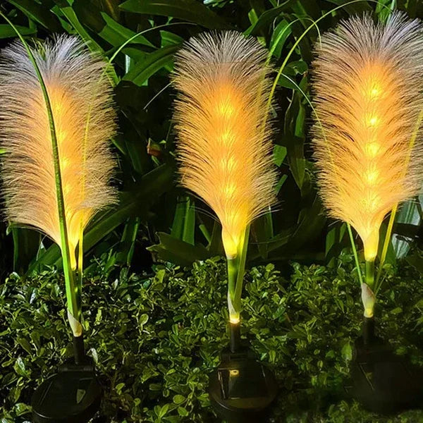 Elegant outdoor reed lights for a sophisticated garden landscape, perfect for decorative lighting.