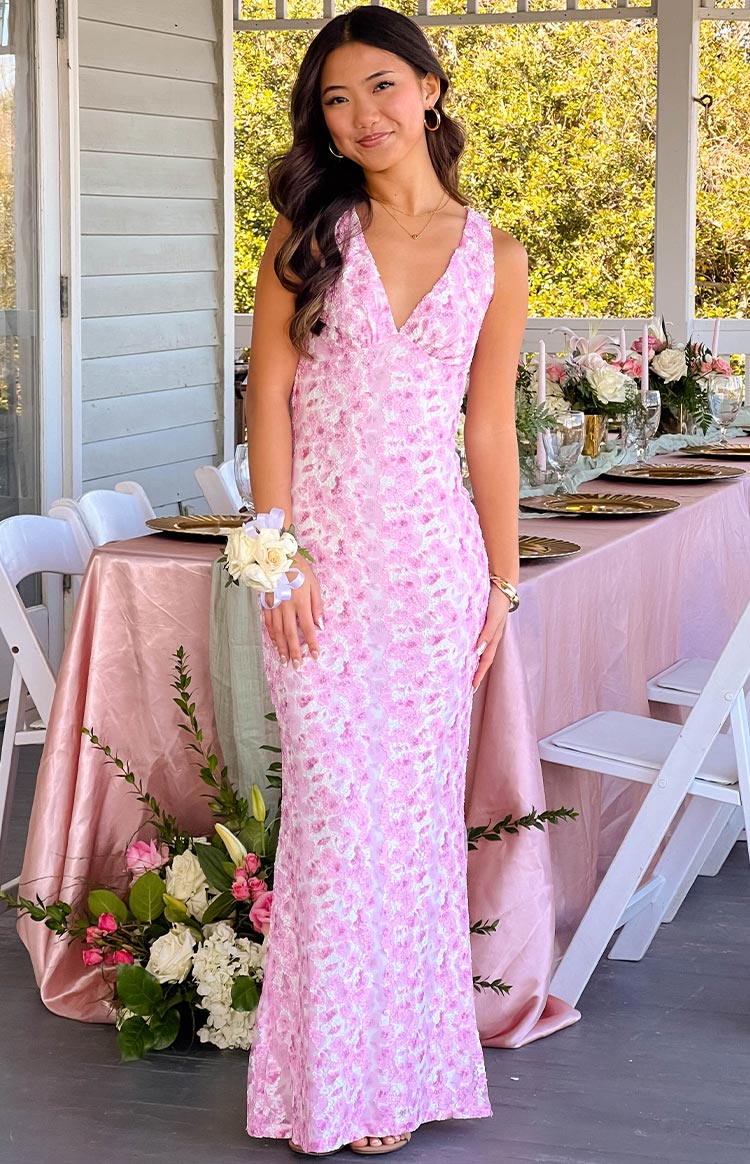 Flowy pink maxi dress designed for special occasions, a timeless evening gown