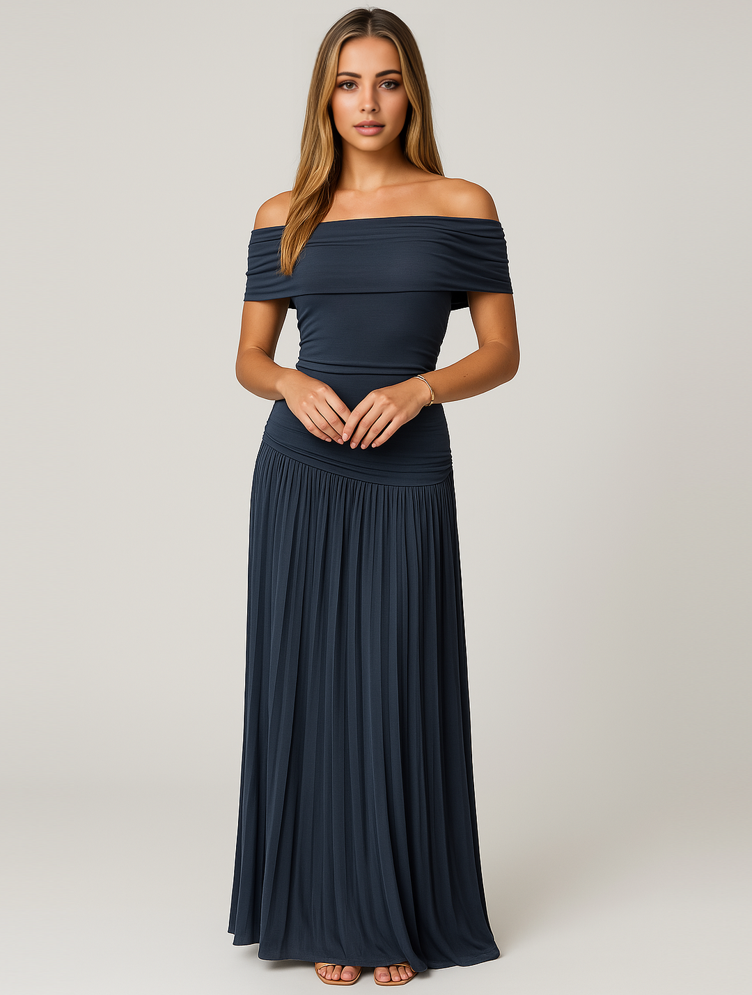 Beautiful women's pleated maxi dress, an elegant option for wedding guest attire.