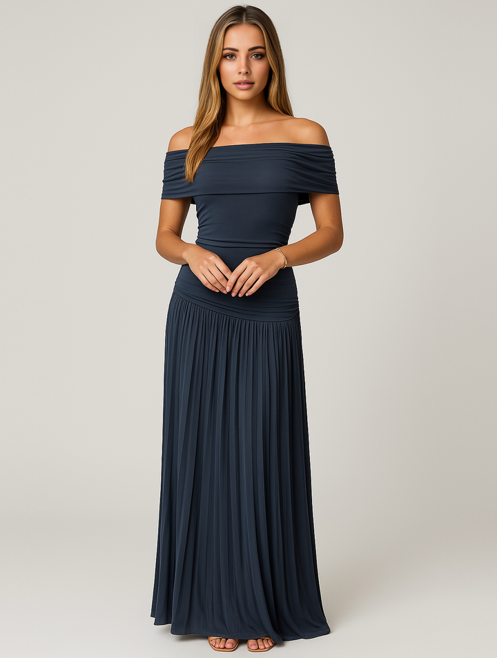 Beautiful women's pleated maxi dress, an elegant option for wedding guest attire.