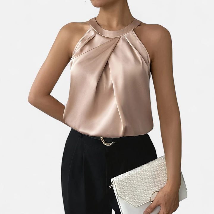 Pleated and draped satin tank top in beige for women, an elegant addition to any formal outfit.