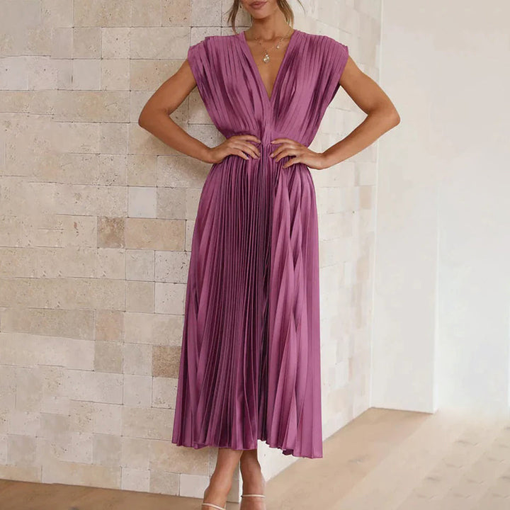 Beautiful pleated midi dress for women, featuring a V-neck, perfect for any special occasion.