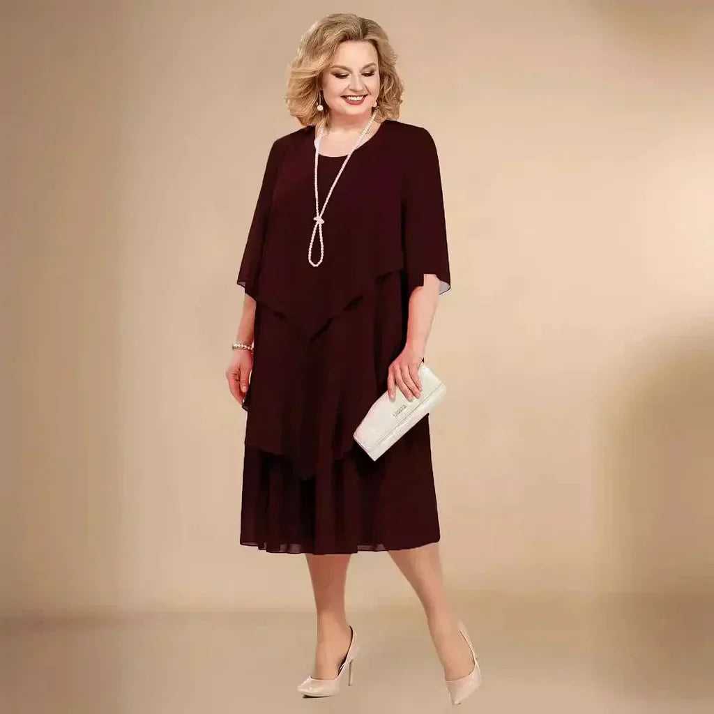 Chic plus size asymmetrical midi dress, ideal for women's formal events. Elegant design for parties.