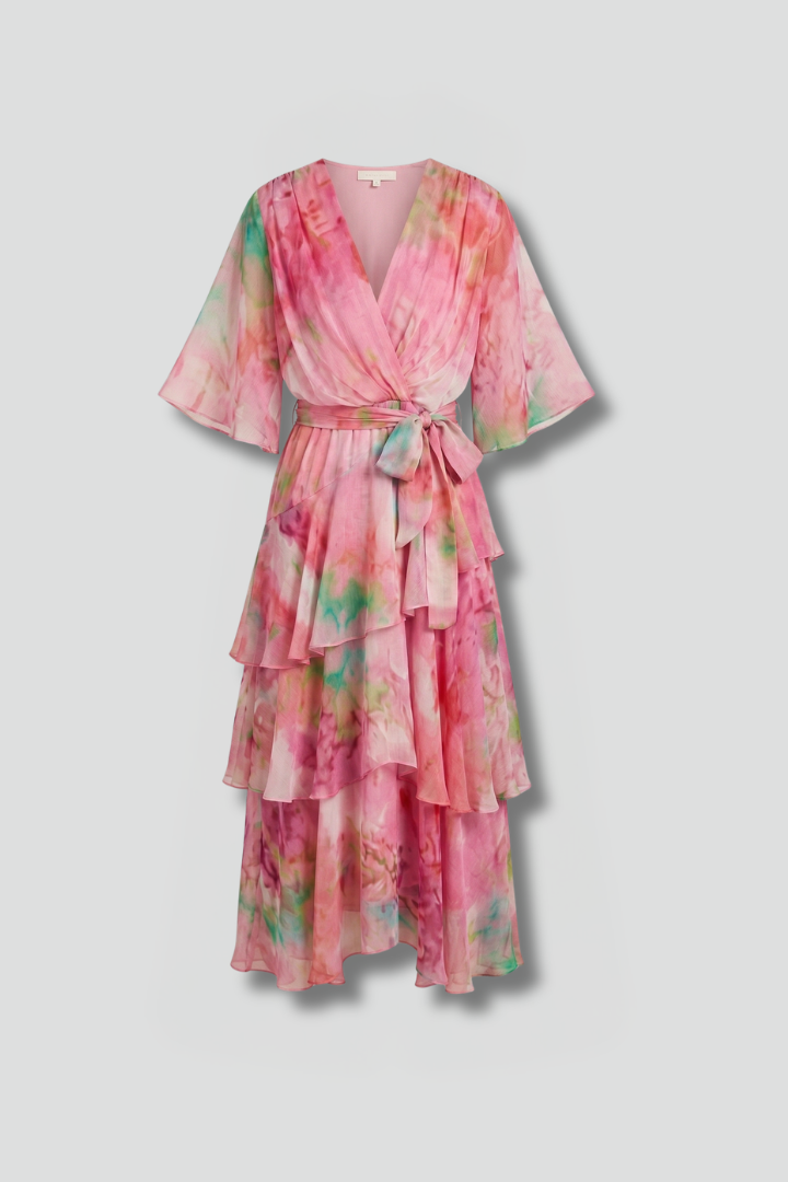 Elegant printed maxi dress for women with flowing skirt and V-neck. Perfect for summer or evening wear.