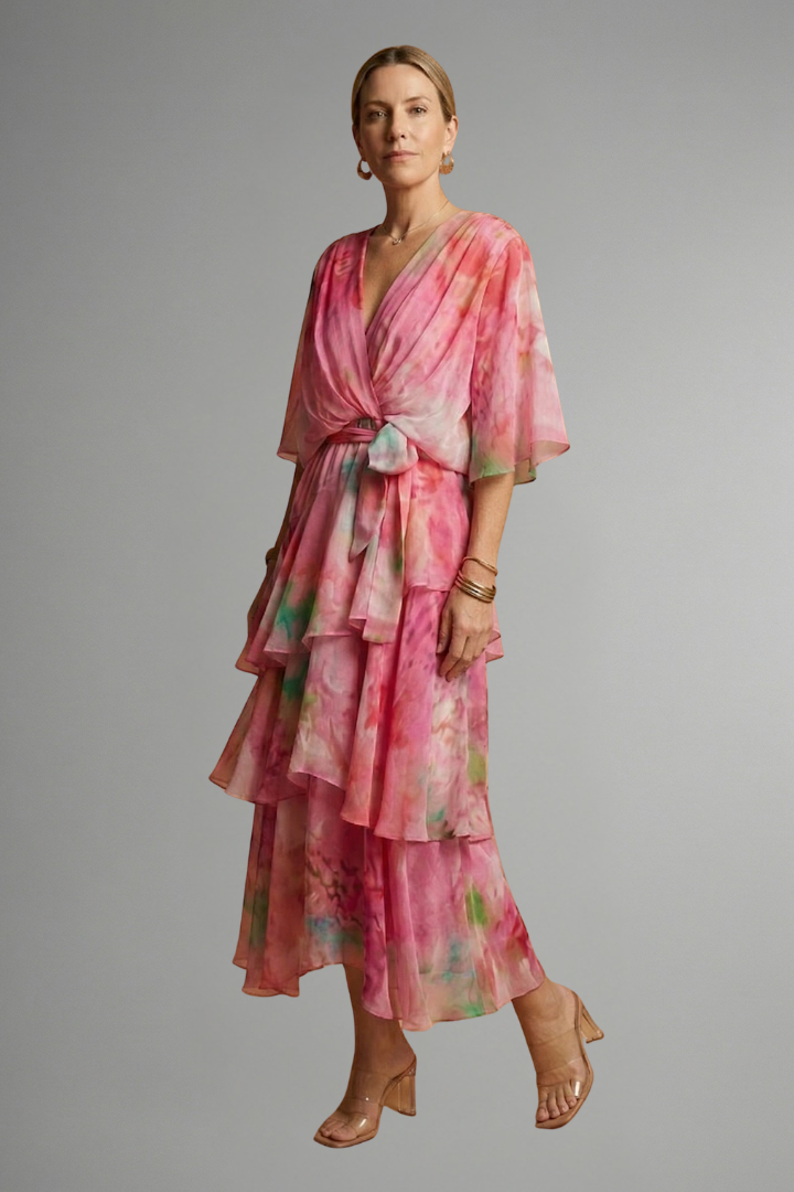 Beautiful printed women's maxi dress, featuring a flattering V-neck and long flowing, comfortable design.