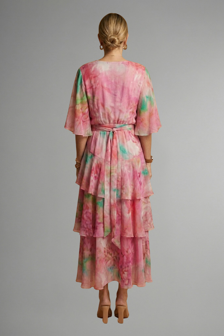 Comfortable women's long-sleeve maxi dress with elegant print and V-neck, suitable for any stylish occasion.