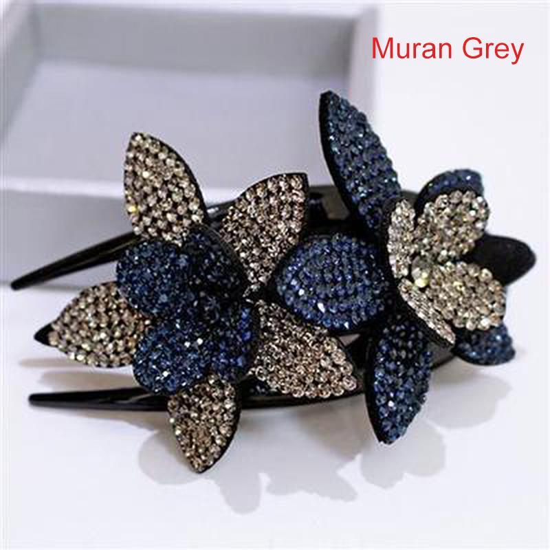Close-up of the delicate rhinestone petals on a women's double flower hair clip, a stunning hair adornment.