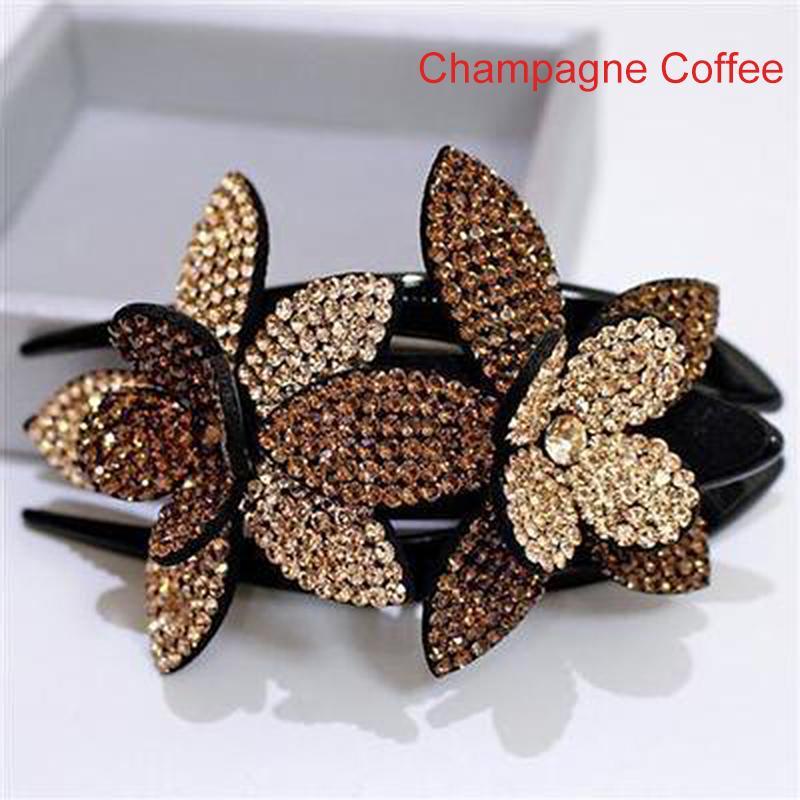 Hand holding a women's rhinestone double flower hair clip, showing its size and intricate detailing.