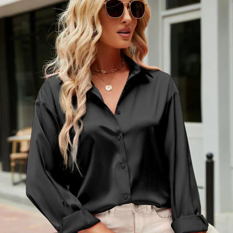 Summer-ready elegant flowing satin blouse, offering chic style and ultimate comfort.