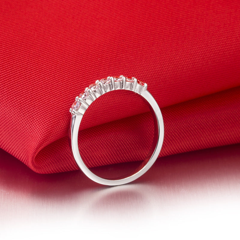 Classic women's fashion ring with seven zircon stones, suitable for any elegant outfit.