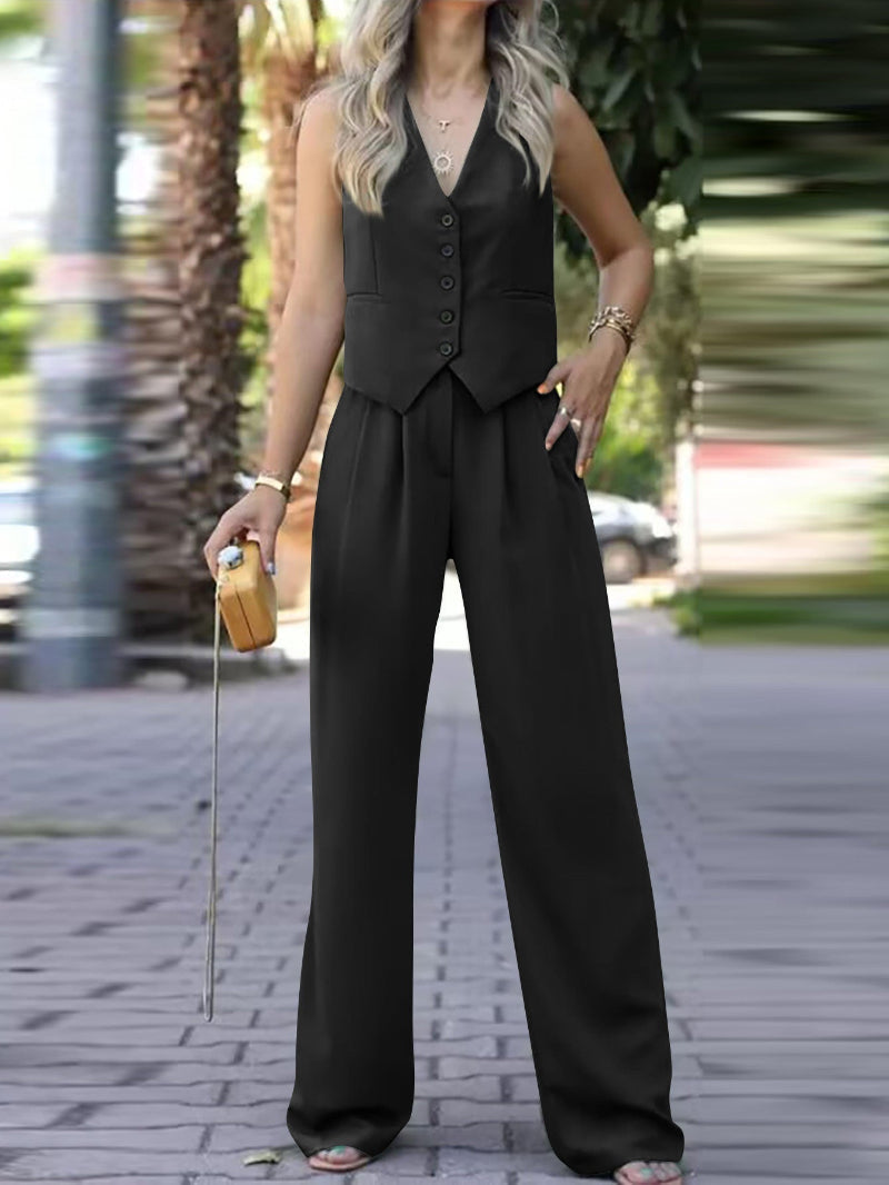 Versatile elegant two-piece women's suit: sleeveless blazer & tailored pants. Great for work or events.