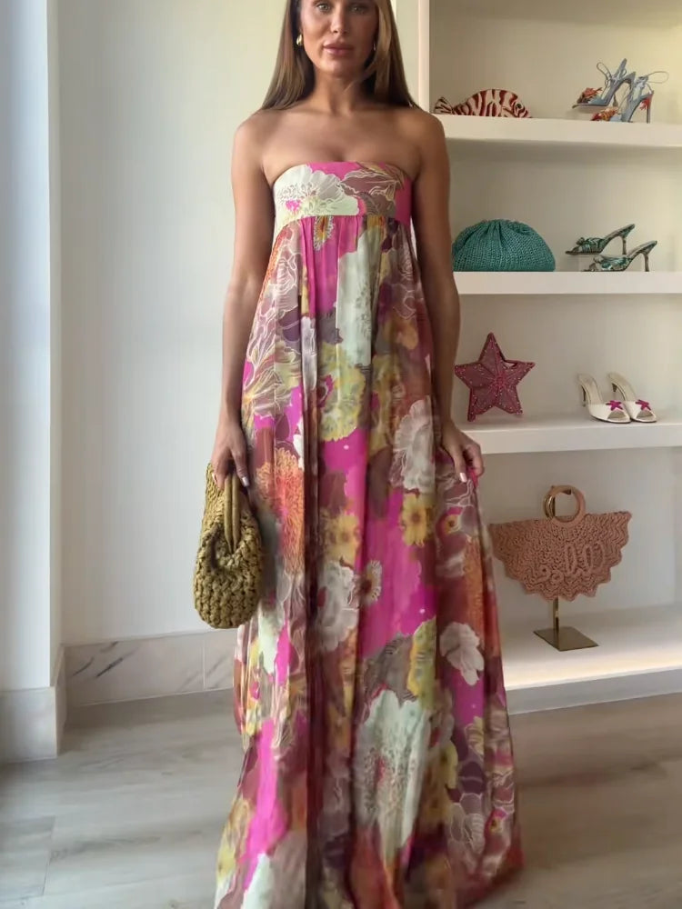 Beautiful floral strapless maxi dress for women, perfect as a wedding guest dress, elegant and stylish for spring.