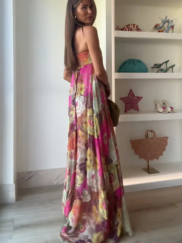 Formal strapless floral maxi dress, an elegant women's wedding guest outfit for summer and spring occasions.