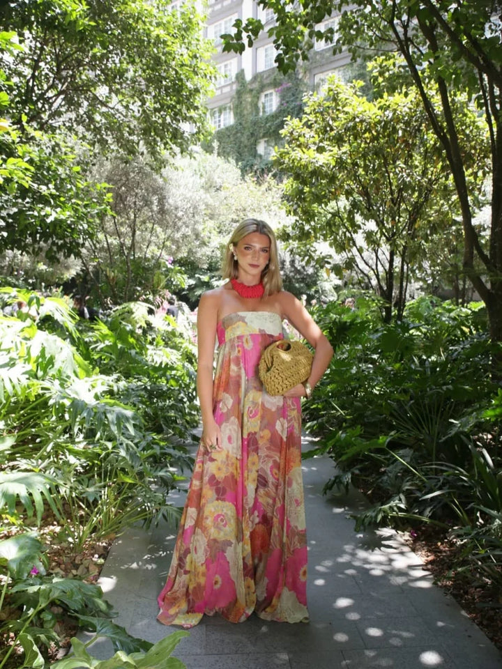 Flowy strapless floral maxi dress, a charming women's wedding guest dress, perfect for elegant evening wear.