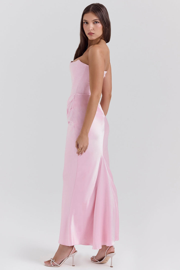 Close-up of the fabric texture of a strapless maxi dress, highlighting its quality for formal events.