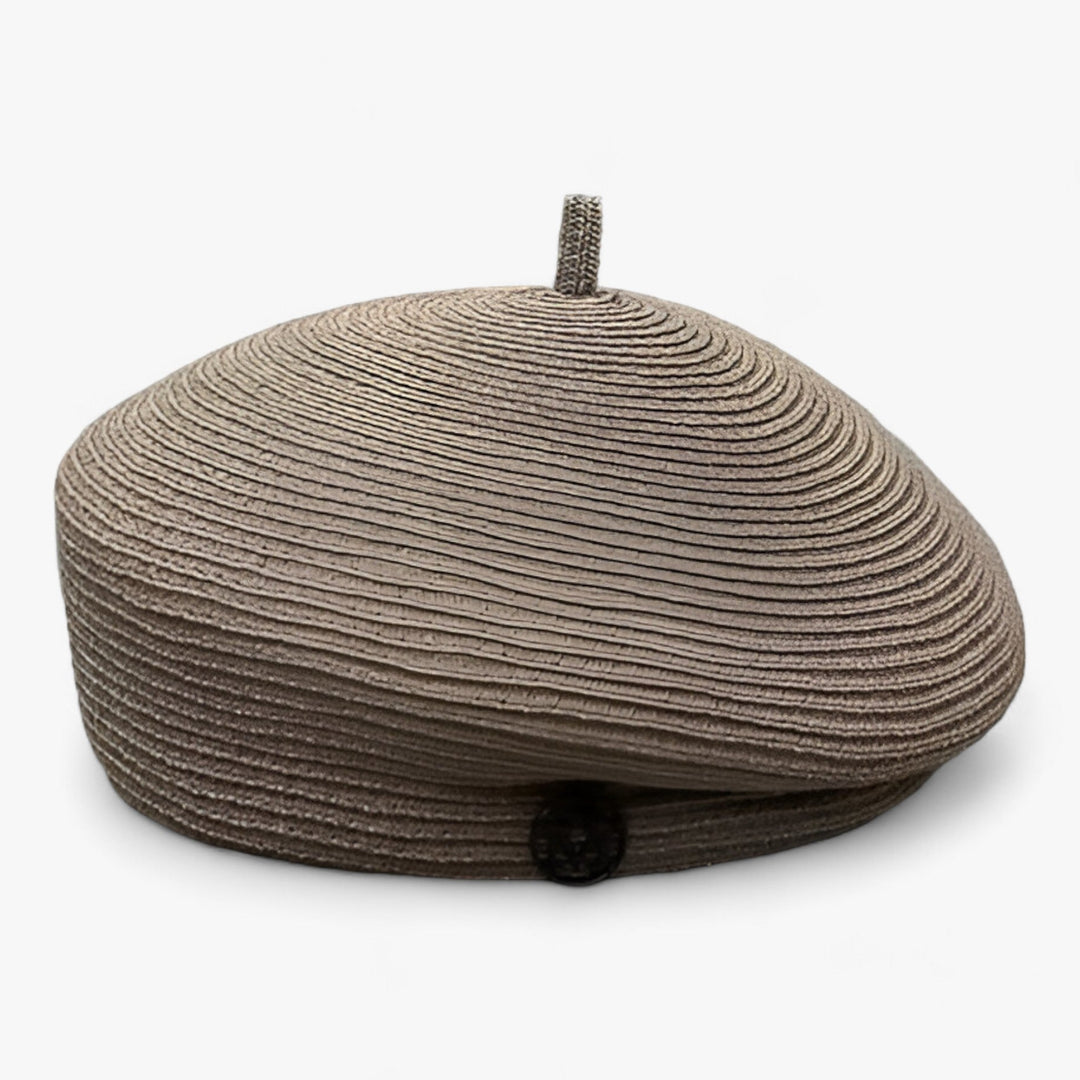 Elegant straw fedora hat for women, perfect for summer fashion and sun protection.