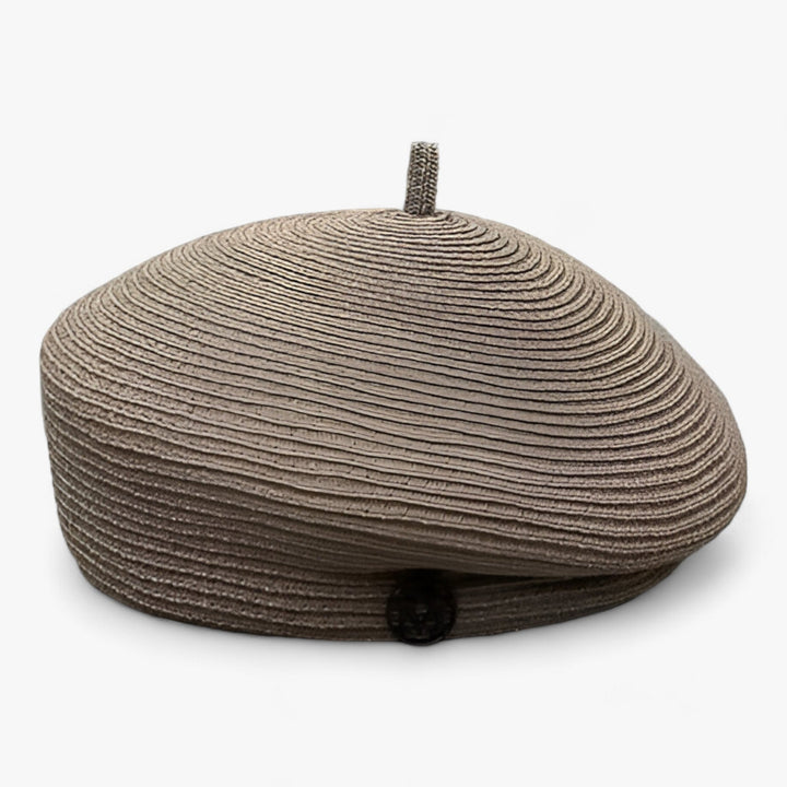 Elegant straw fedora hat for women, perfect for summer fashion and sun protection.