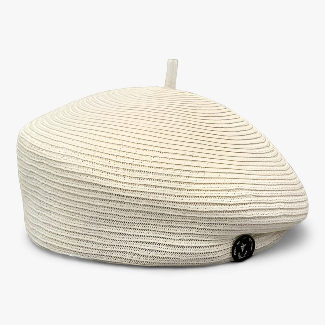 Chic brown straw fedora, a stylish beach accessory for women offering sun protection.