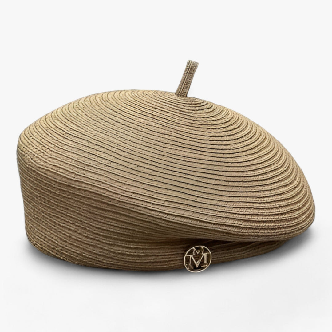 Stylish women's straw fedora, an ideal brown travel hat for elegant summer adventures.