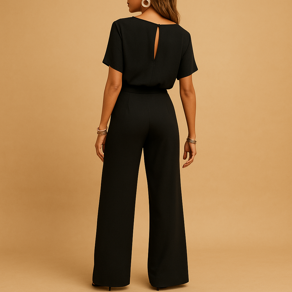 Sophisticated women's jumpsuit featuring a tailored cut and elegant flowy sleeves for parties.