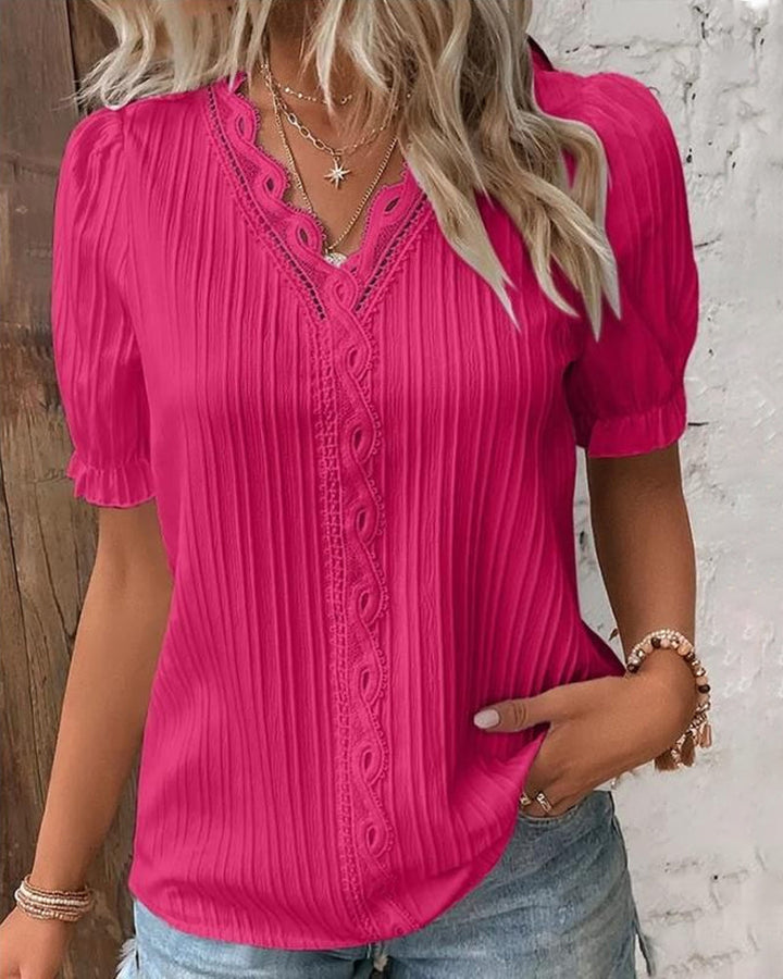 Elegant women's V-neck lace top, designed with comfort and fashion in mind for warm weather