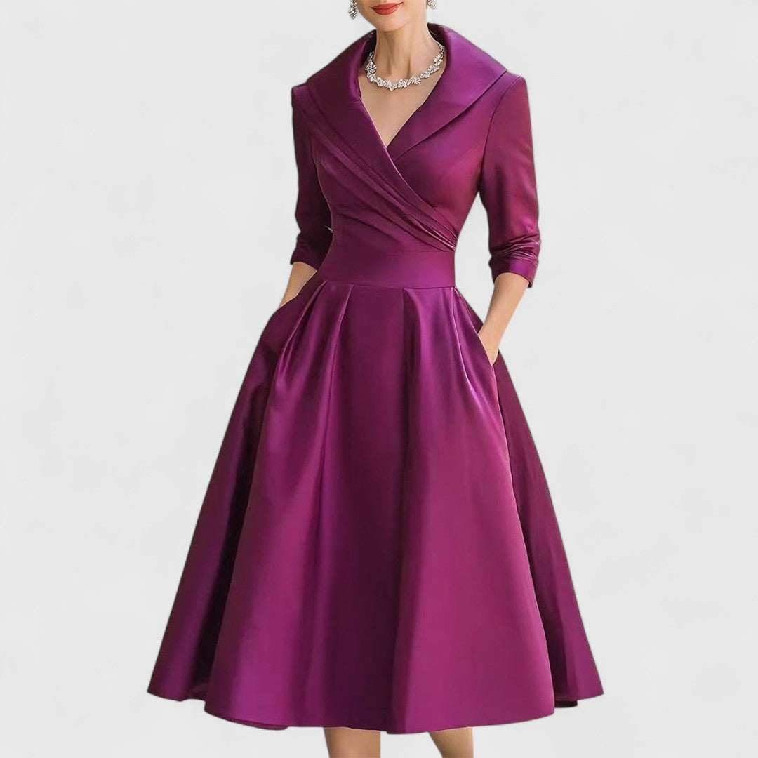Versatile women's V-neck midi dress with pockets and flared skirt, suitable for both casual and elegant occasions.