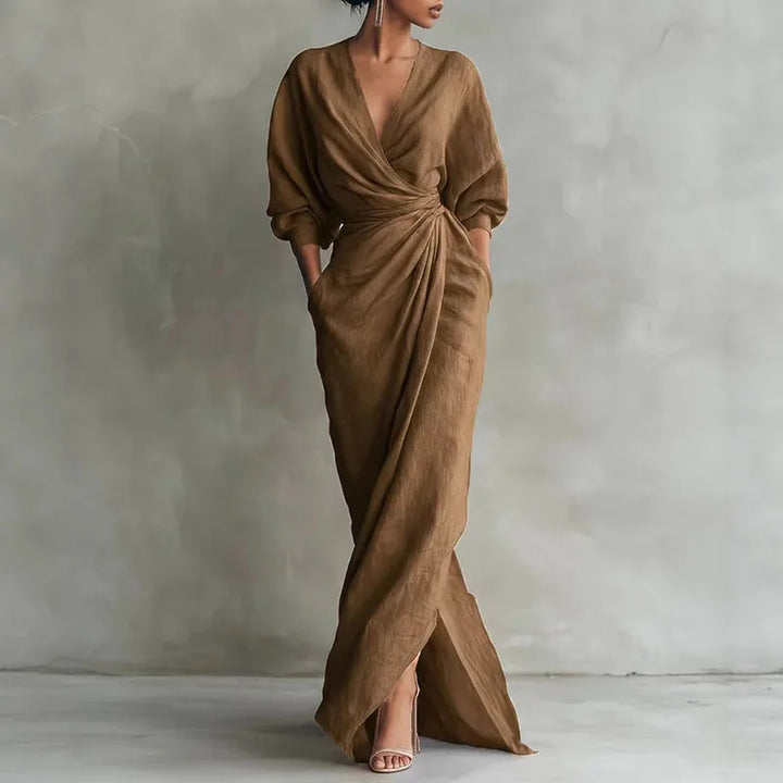 Pink elegant V-neck wrap maxi dress for women. Flattering long sleeve design, perfect for sophisticated events.