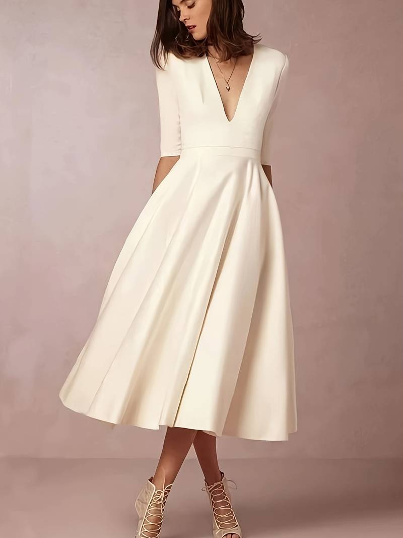 Formal women's flared midi dress in white, ideal for special occasion, evening wear, or party.