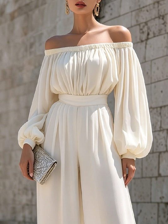 Beautiful white off-shoulder maxi dress for women, featuring exquisite bishop sleeves. Formal wear.