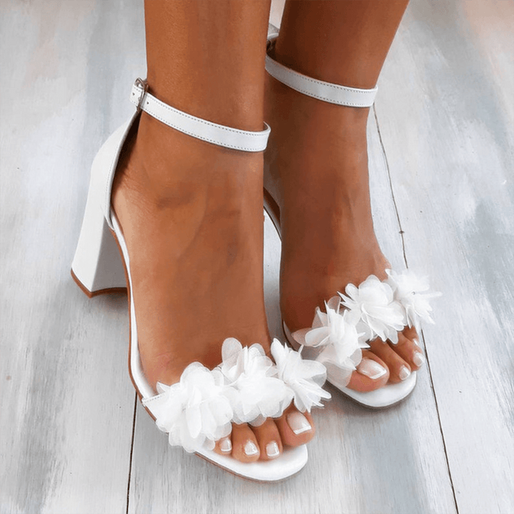 Elegant white women's block heel ankle strap sandals, comfortable for summer, work, and evening wear.