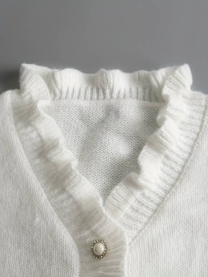 Fashionable long sleeve women's ruffle blouse, versatile for both casual outings and elegant events.