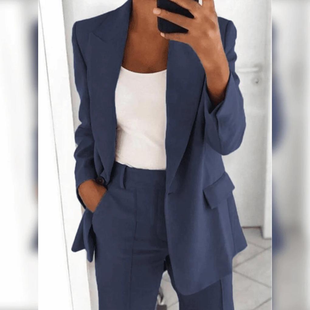 Tailored women's trousers, matching component of an elegant 2-piece business suit. Comfortable formal wear.