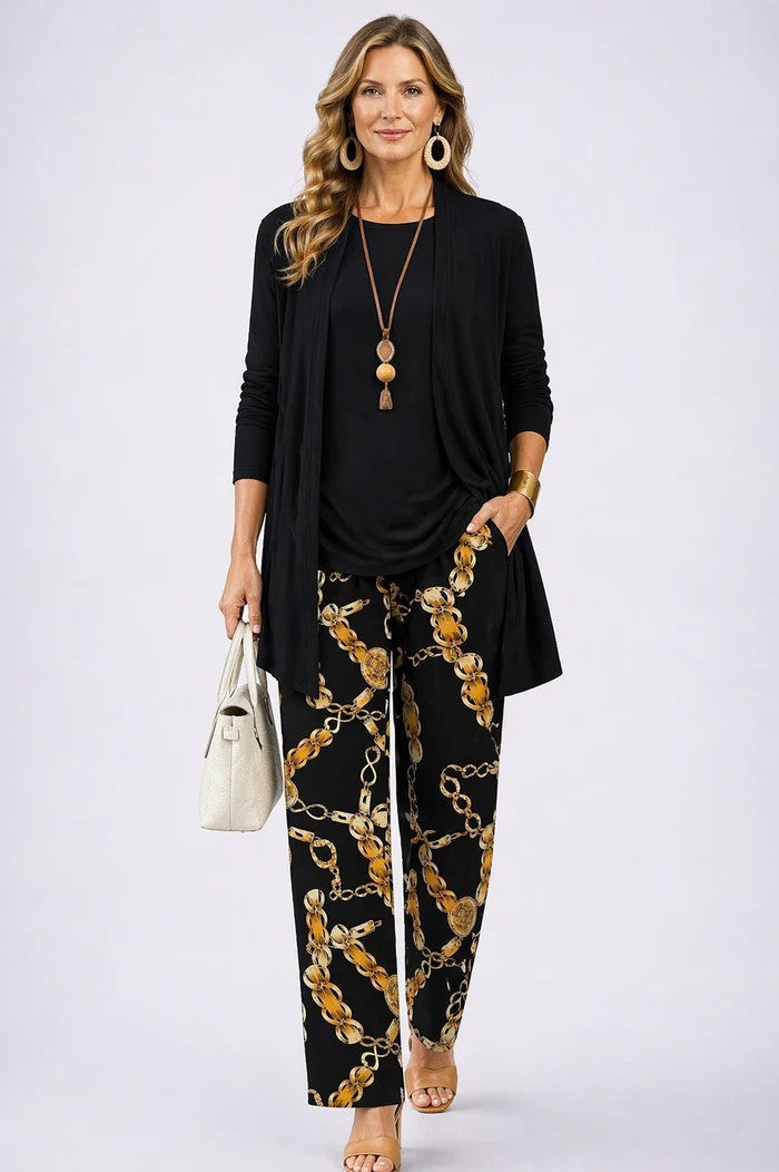 Coordinated women's 3-piece blazer set. Includes elegant blazer, matching top & tailored trousers.