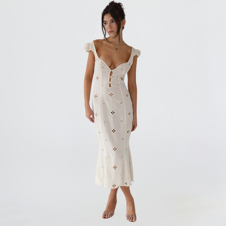 Sophisticated black midi dress with delicate lace detailing, ideal for evening parties or cocktail events.