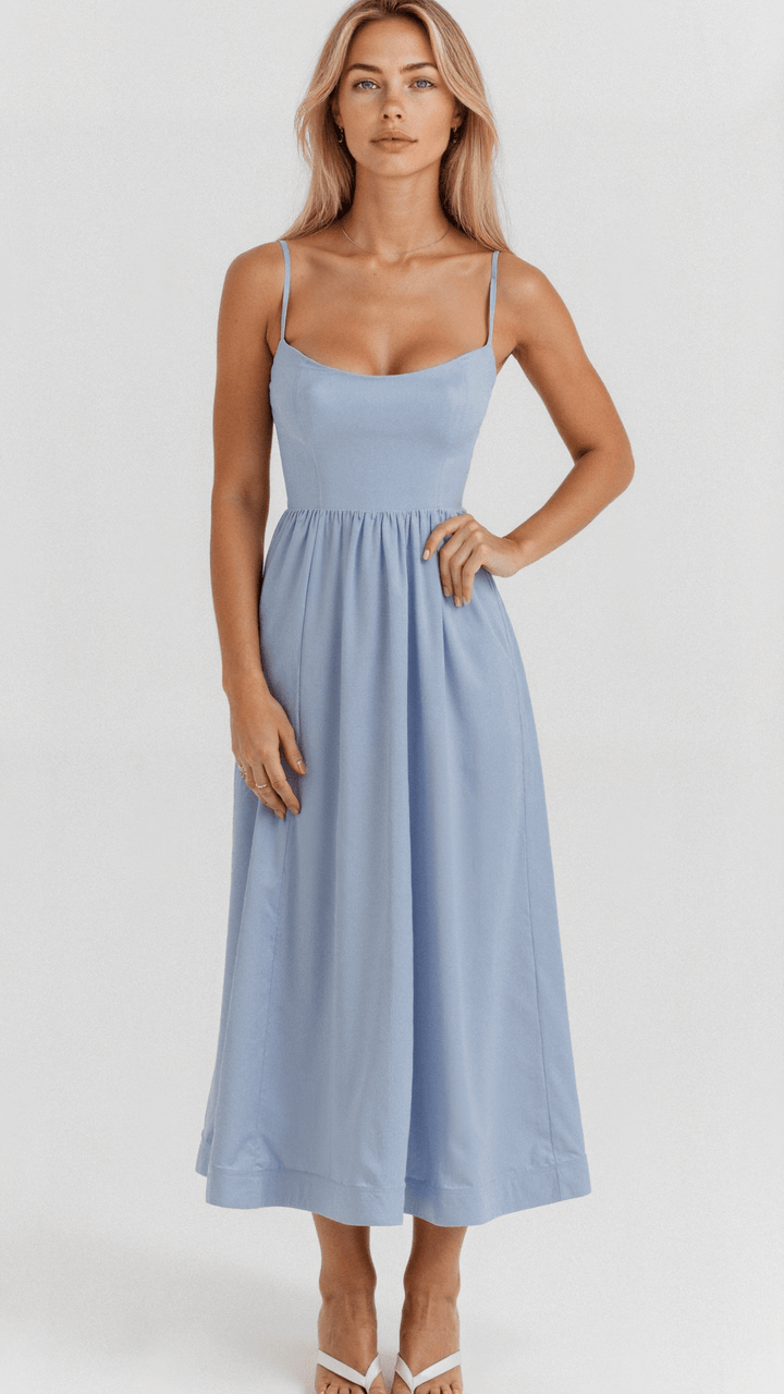 Chic women's midi dress with spaghetti straps & elegant A-line cut. Ideal for casual chic or special events.