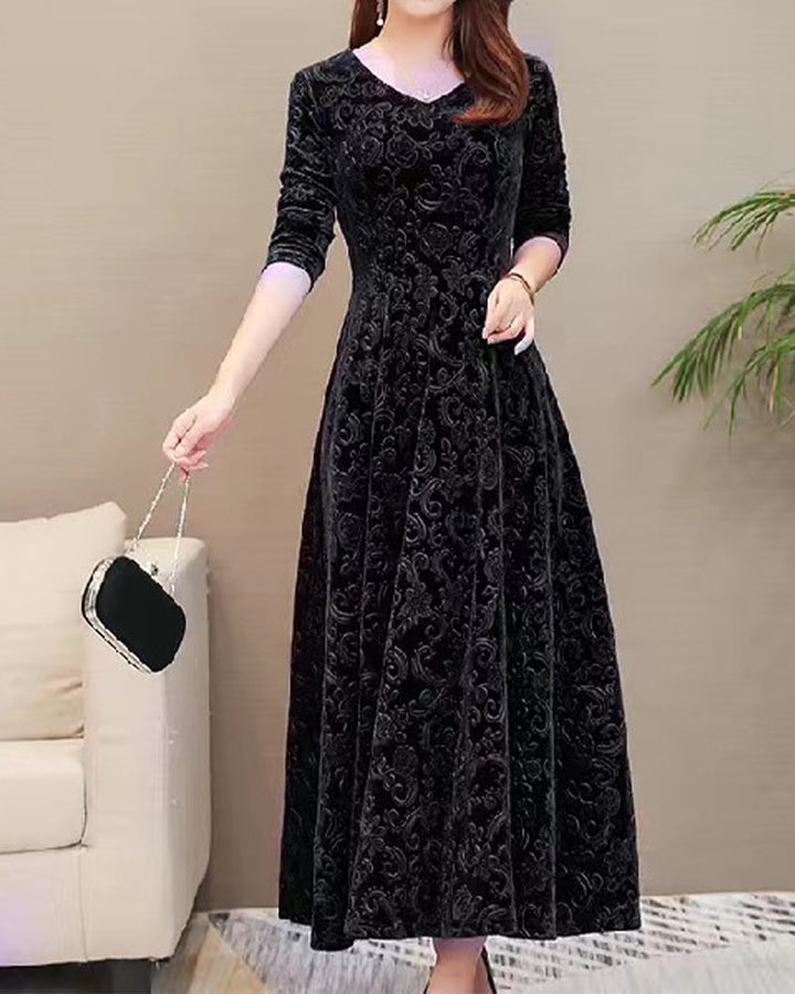 Chic women's A-line V-neck midi dress. Offers versatile, flattering style for elegant office & casual outfits.