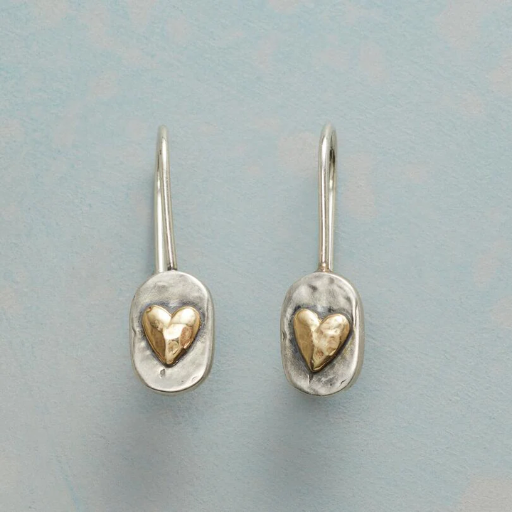Elegant Women's Art Deco silver heart dangle earrings. Stylish drop jewelry, perfect for special occasions.
