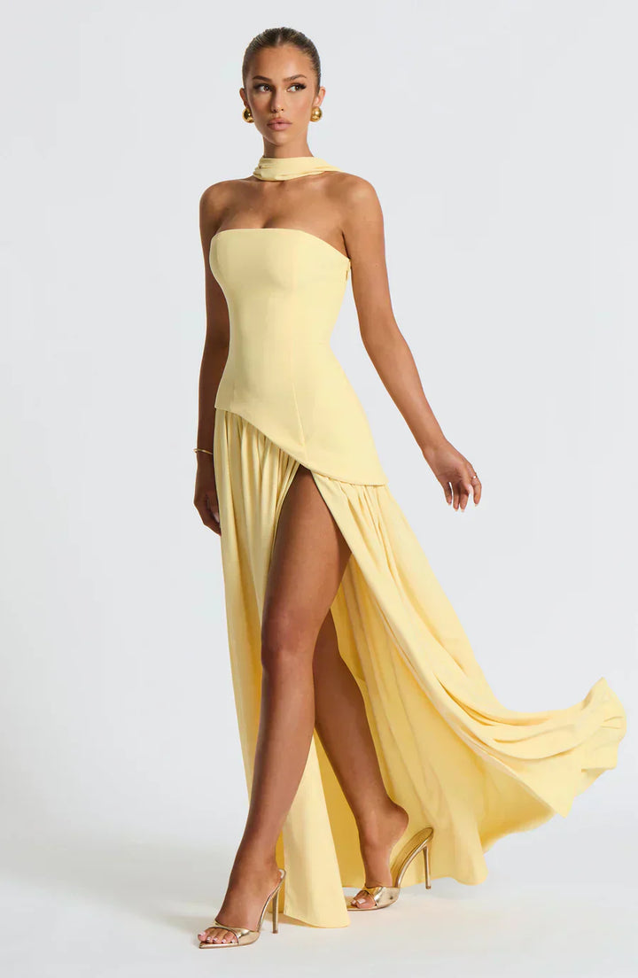 Elegant women's asymmetrical maxi dress in navy, perfect for a wedding guest or formal evening.