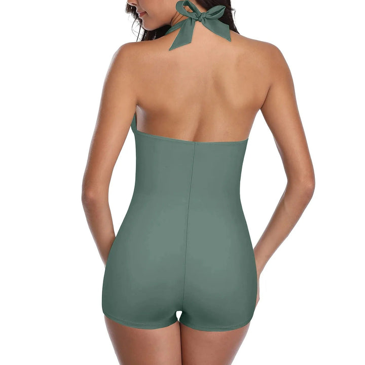 Sophisticated women's backless one-piece swimsuit. Elegant design & molded cups for beach & pool fashion.