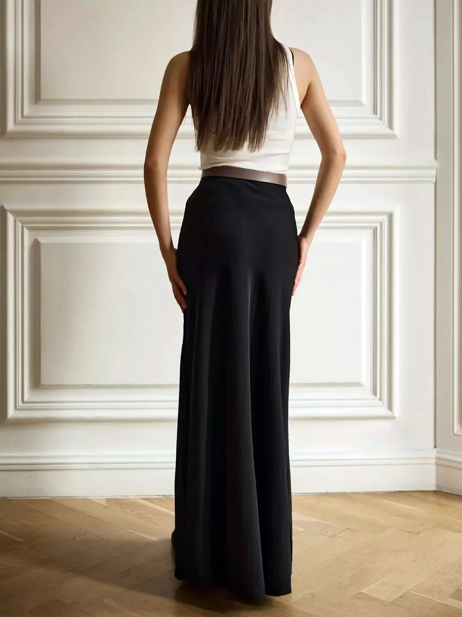 Elegant high-waist formal skirt with a dramatic fishtail hem, ideal for evening galas.