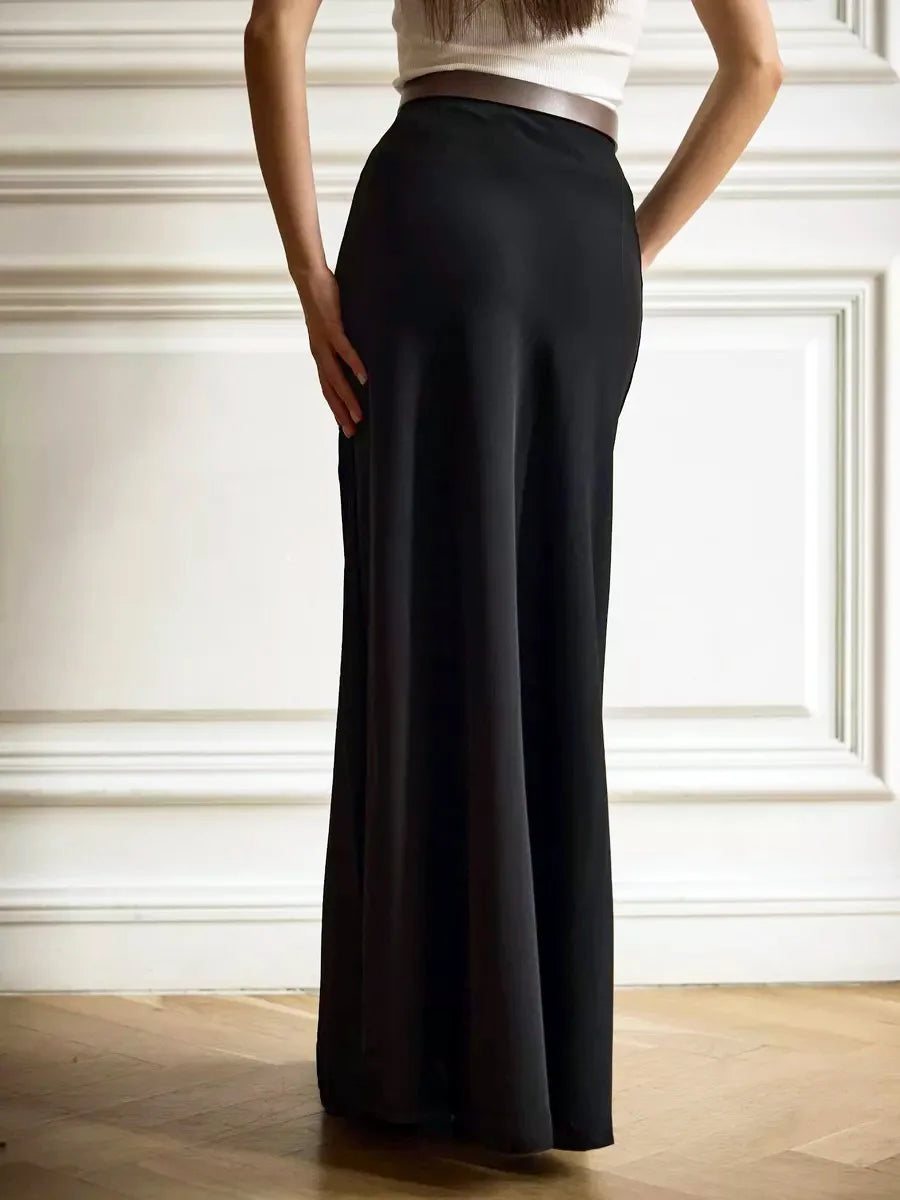 Stunning high-waist evening skirt, long and flowing with a fishtail bottom.