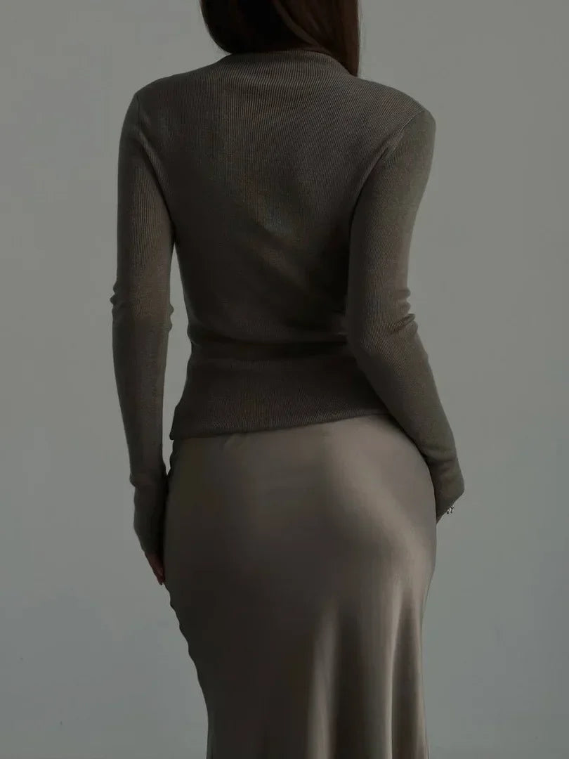Graceful high-waist fishtail maxi skirt, a sophisticated choice for formal occasions.