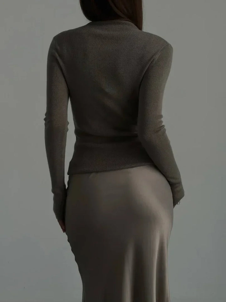 Graceful high-waist fishtail maxi skirt, a sophisticated choice for formal occasions.
