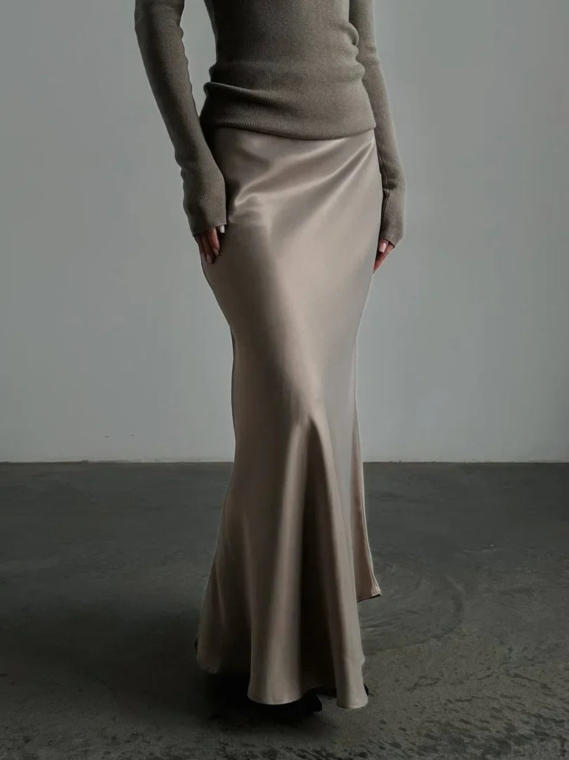 Formal maxi skirt with a high waist and elegant fishtail hem, perfect for evening wear.