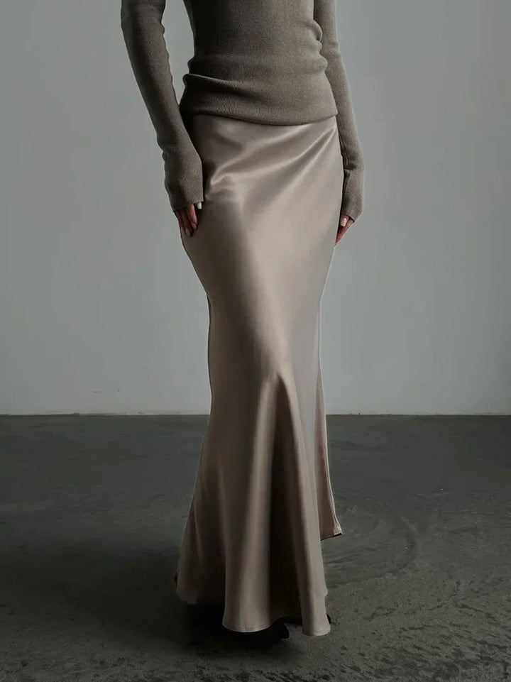 Formal maxi skirt with a high waist and elegant fishtail hem, perfect for evening wear.