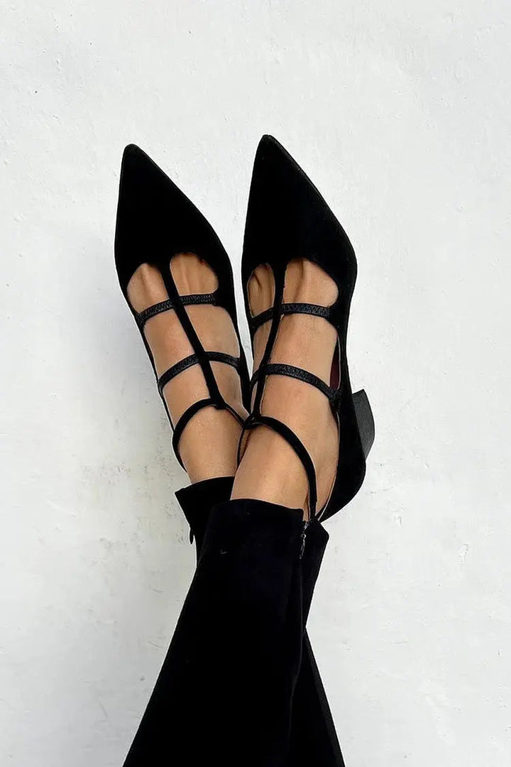 Elegant women's black strappy pointed toe flats, perfect for dressy occasions or professional workwear.